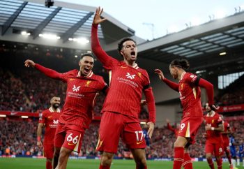 Liverpool F.C. Players Celebrating After Scoring Against Premier League Opponents Southampton