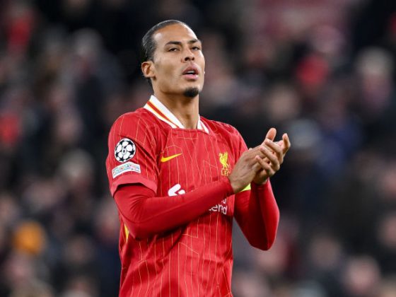 Virgil van Dijk Clapping While in Action for Liverpool