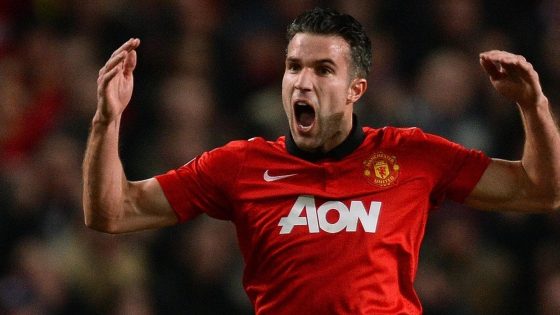 Robin van Persie Shouting and Celebrating After Scoring Against Olympiacos in the Champions League