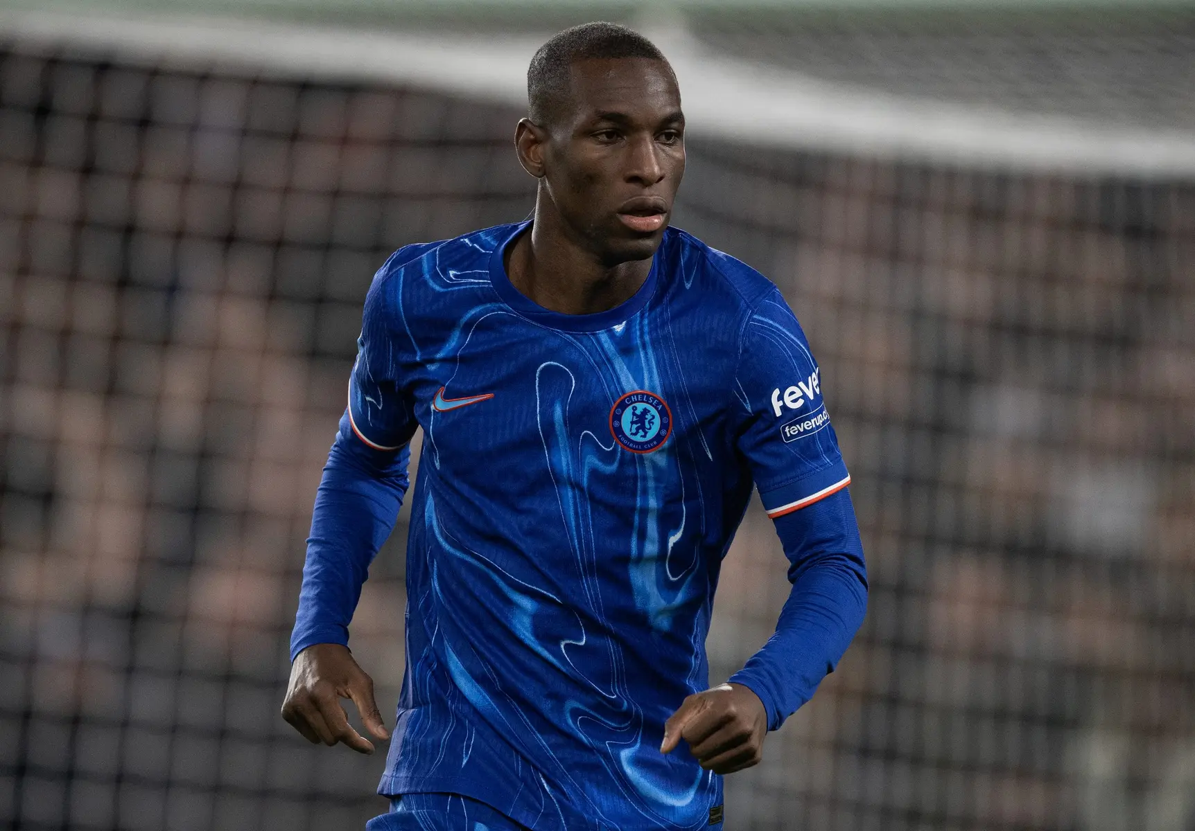 Nicolas Jackson in a blue Chelsea FC home kit during a match
