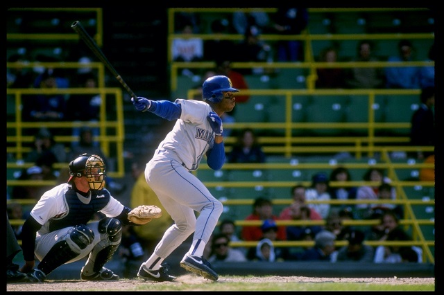 Ken Griffey Jr. gets ready to run to first base.