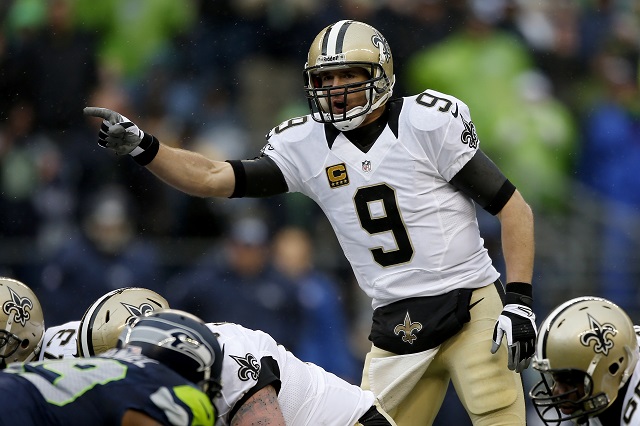 Drew Brees leads his team on a drive