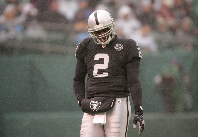 JaMarcus Russell wakes off the field after a play.