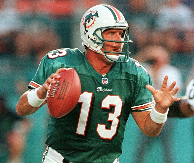 Dan Marino grips the football and focuses on his receivers.