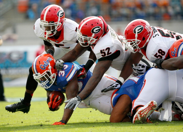 two football teams battling