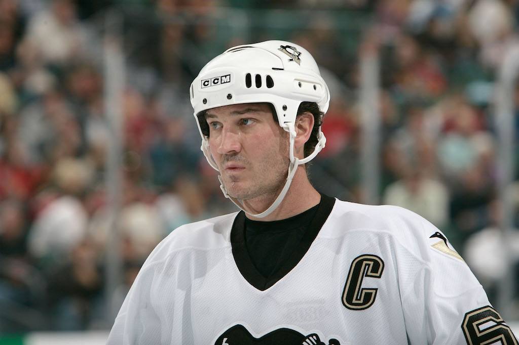 Mario Lemieux looks pensive on the ice.