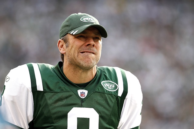 Mark Brunell watches the action from the sideline.