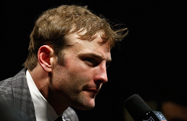 Wide receiver Wes Welker speaks to the media during a press conference. 