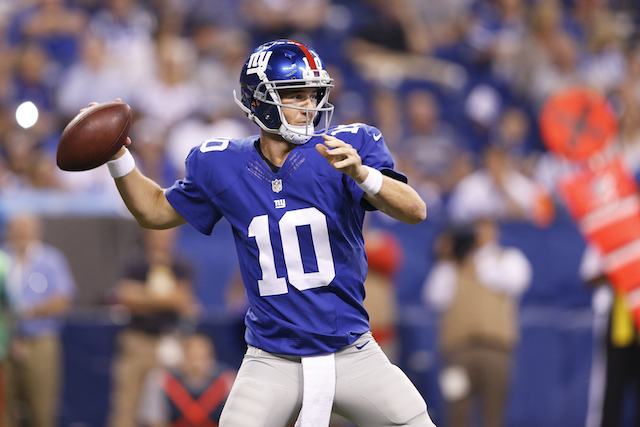 Eli Manning prepares to throw against the Colts