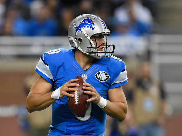 Matthew Stafford looks for a target in the backfield.