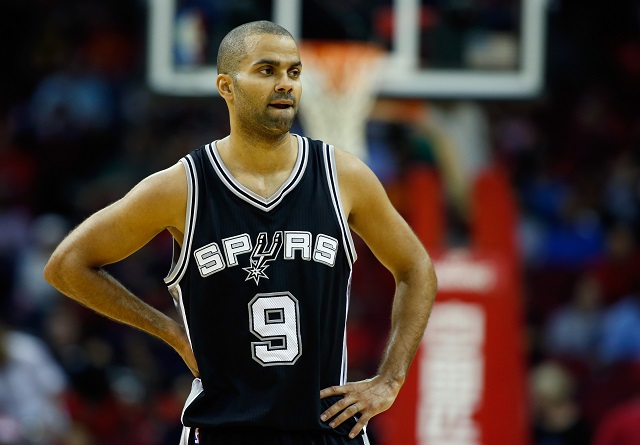 HOUSTON, TX - OCTOBER 24:  Tony Parker #9 of the San Antonio Spurs waits on the court at the start of their preseason game against the Houston Rockets at Toyota Center on October 24, 2014 in Houston, Texas NOTE TO USER: User expressly acknowledges and agrees that, by downloading and/or using this photograph, user is consenting to the terms and conditions of the Getty Images License Agreement. Mandatory copyright notice:  (Photo by Scott Halleran/Getty Images)
