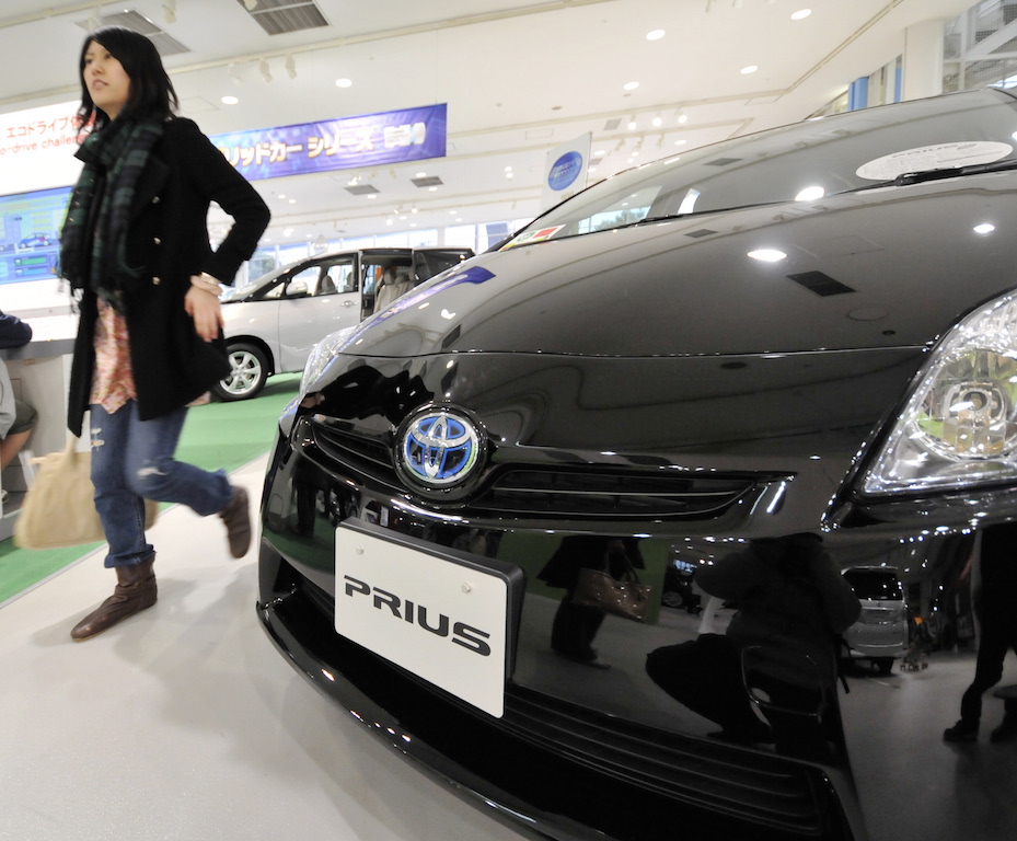 a black prius at a car show