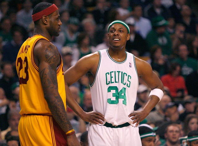 The Celtics look scared as LeBron James walks by.
