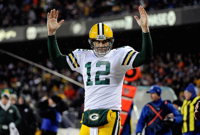 Aaron Rodgers acknowledges a touchdown against the Bears