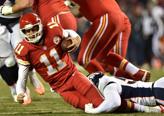 Alex Smith of the Kansas City Chiefs is sacked by Von Miller of the Denver Broncos | Peter Aiken/Getty Images