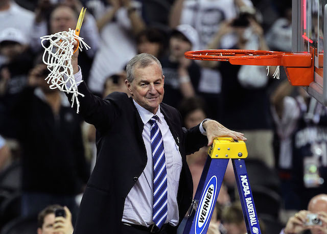 Jim Calhoun cuts down the nets.