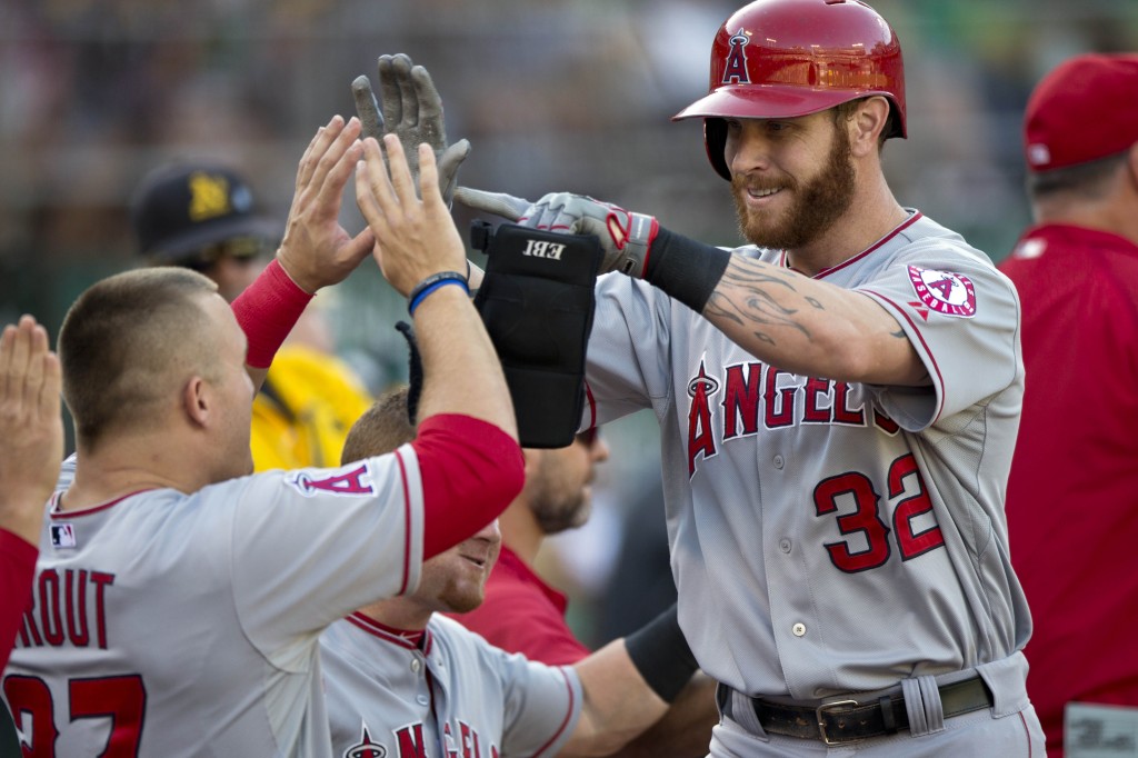 Josh Hamilton celebrates with Angels star Mike Trout