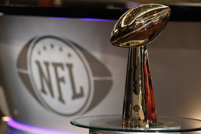 Light shines on the Lombardi Trophy display.