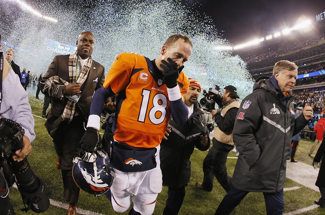 Peyton Manning walks off the field after losing the Super Bowl to the Seattle Seahawks.