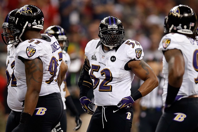 Ray Lewis puts his hands on his hips between plays.