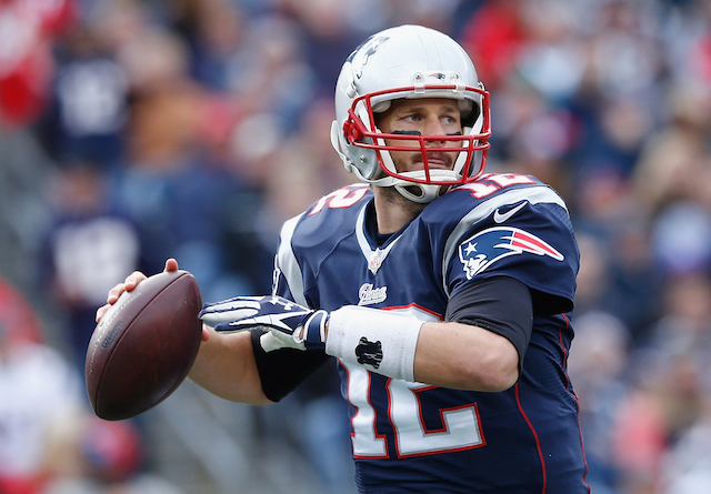 Quarterback Tom Brady looks for his target.