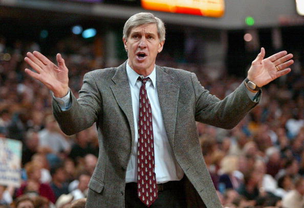 Jerry Sloan waves his hands at his players.