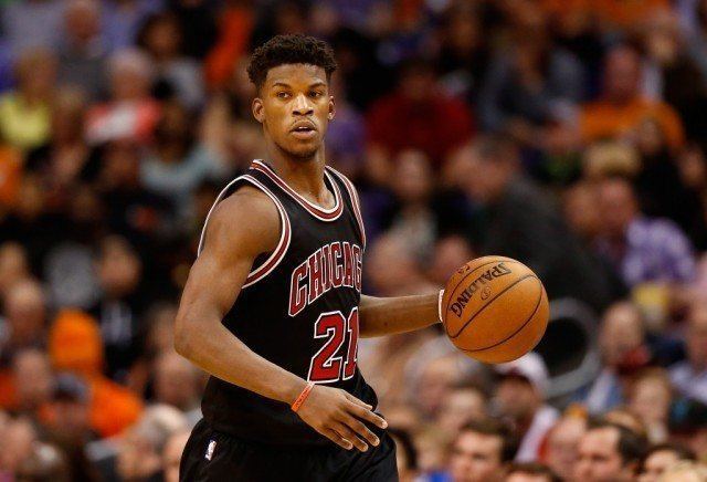 Jimmy Butler dribbles against the Phoenix Suns
