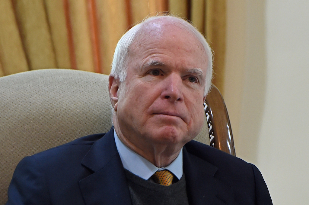 US Senator John McCain looks on during a meeting with Afghan Chief Executive Officer Abdullah Abdullah.