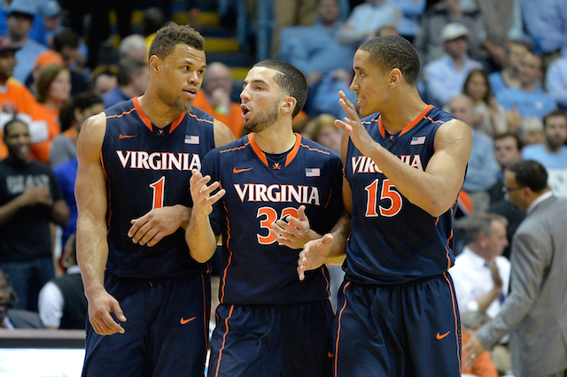 Virginia players chat during a timeout