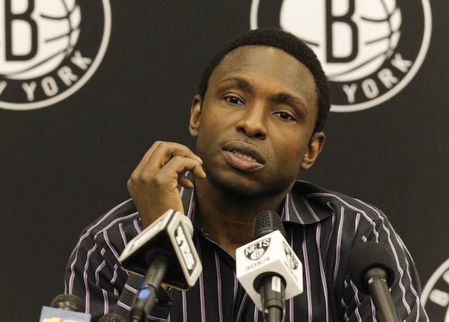 Avery Johnson speaks at a press conference