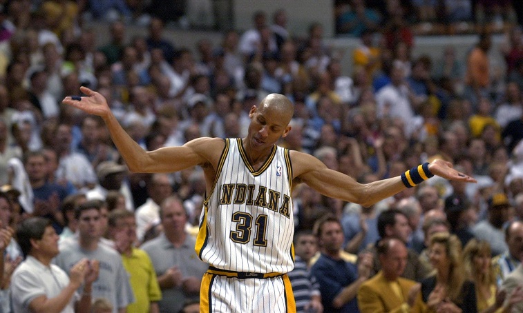 Indianapolis Pacers' Reggie Miller tries to get the crowd going during the first quarter of their Eastern Conference semi-final against the Philadelphia 76ers in Indianapolis