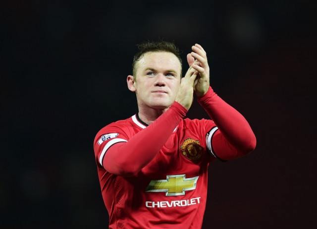 Wayne Rooney thanks the fans after winning a game.