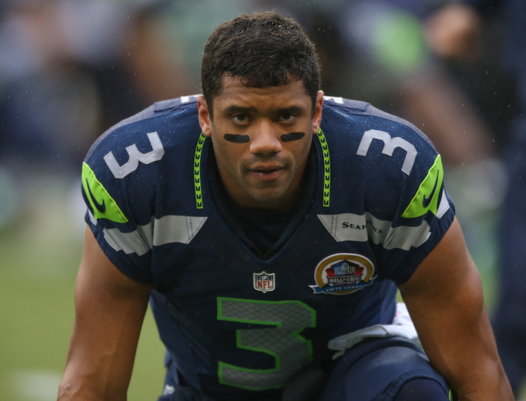 Russell Wilson prepares to take the field