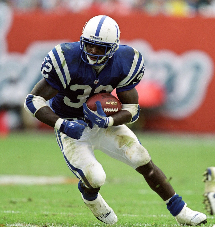 Andy Lyons/Getty Images5 Dec 1999: Edgerrin James #32 of the Indianapolis Colts runs with the ball during the game against the Miami Dolphins at the Pro Player Stadium in Miami, Florida. The Colts defeated the Dolphins 37-34. Mandatory Credit: Andy Lyons /Allsport