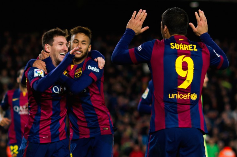 Barcelona players celebrate a goal