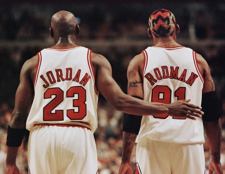 Michael Jordan and Dennis Rodman walk up the floor.