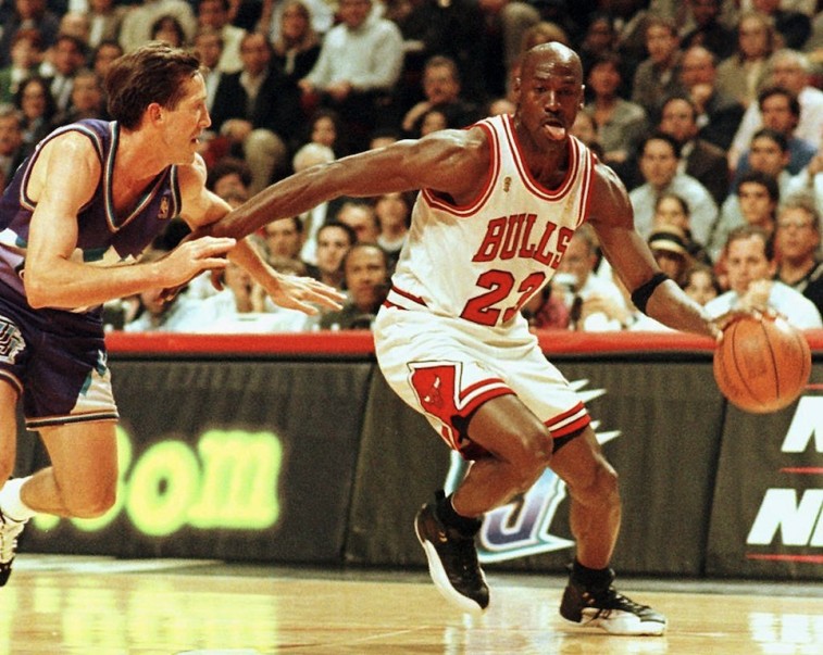 Michael Jordan drives to the basket.