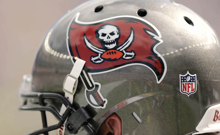 FOXBORO, MA - SEPTEMBER 22:  A Tampa Bay Buccaneers helmet and logo are seen during the second half of their 23-3 loss to the New England Patriots  at Gillette Stadium on September 22, 2013 in Foxboro, Massachusetts.  (Photo by Winslow Townson/Getty Images)