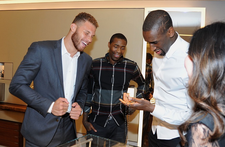 Blake Griffin checks out the goods at a promotional event.