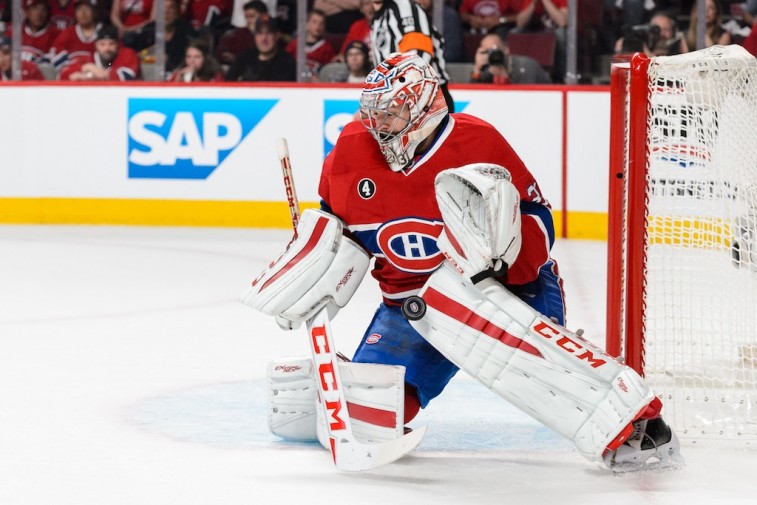 Carey Price makes a pad safe against the Lightning