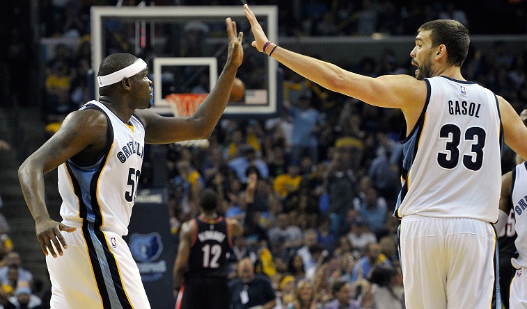  Zach Randolph #50 of the Memphis Grizzlies high fives teammate Marc Gasol #33 after a basket against the Portland Trailblazers in the second half of Game One of the first round of the 2015 NBA Playoffs at FedExForum on April 19, 2015 in Memphis, Tennessee.