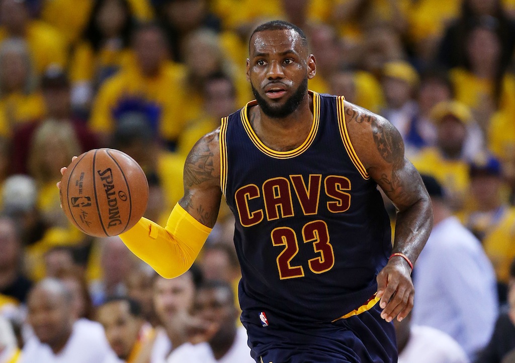 LeBron James, sometimes the most hated man in sports, dribbles the ball