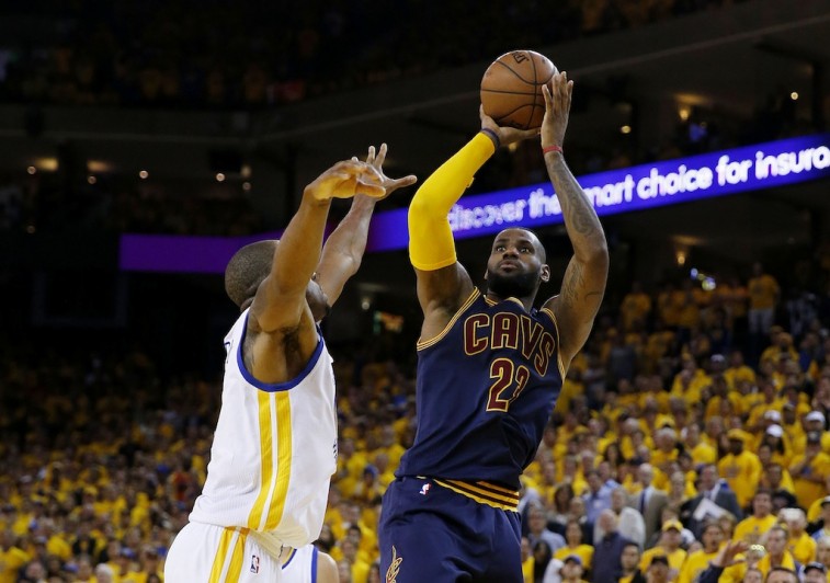 LeBron James shoots over Andre Iguodala in Game 5
