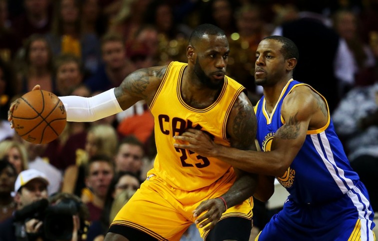 LeBron James tries to post up Andre Iguodala in Game 4