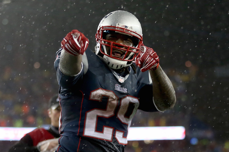 LeGarrette Blount points at the camera as he celebrates scoring a touchdown.
