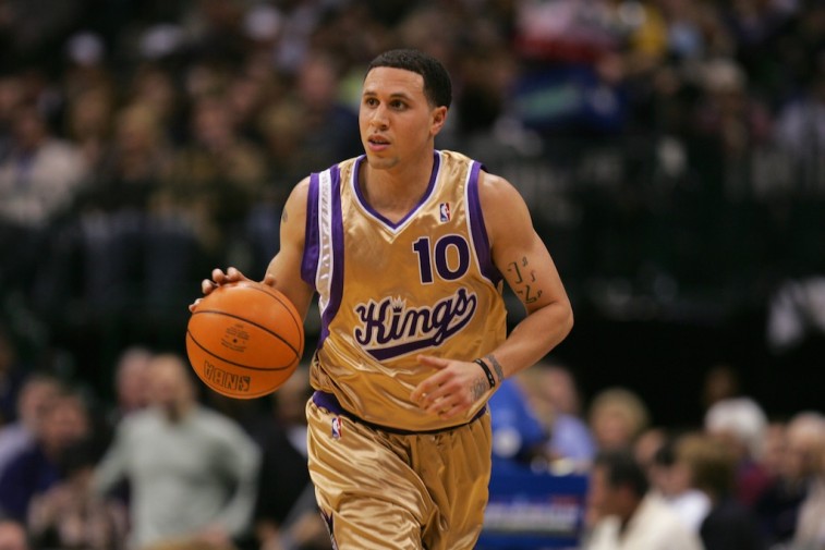 Mike Bibby brings the ball upcourt.