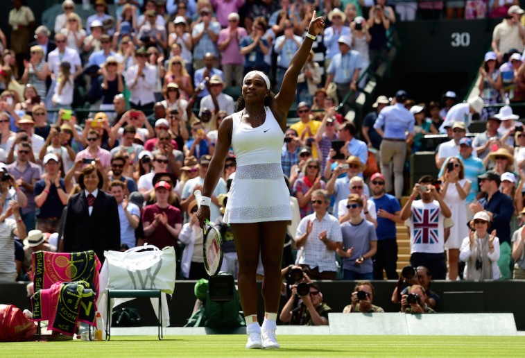 Serena Williams celebrates winning her first round match at the 2015 Wimbledon