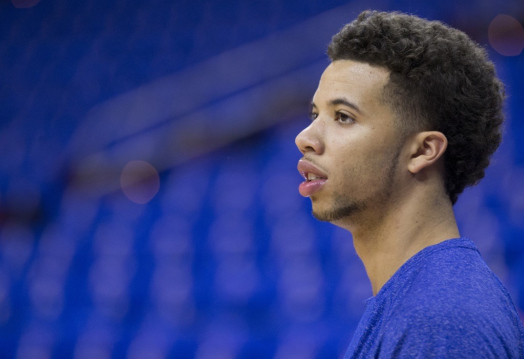 Michael Carter-Williams looks on before a game.