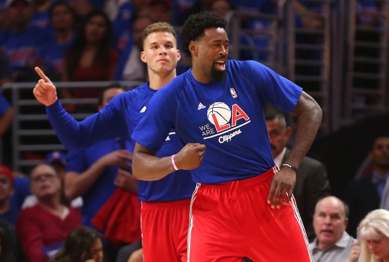 LOS ANGELES, CA - MAY 10: DeAndre Jordan #6 (R) and Blake Griffin #32 of the Los Angeles Clippers celebrate from the bench as they sit out the closing minutes of the fourth quarter against the Houston Rockets during Game Four of the Western Conference semifinals of the 2015 NBA Playoffs at Staples Center on May 10, 2015 in Los Angeles, California. The Clippers won 128-95. NOTE TO USER: User expressly acknowledges and agrees that, by downloading and or using this photograph, User is consenting to the terms and conditions of the Getty Images License Agreement. (Photo by Stephen Dunn/Getty Images)