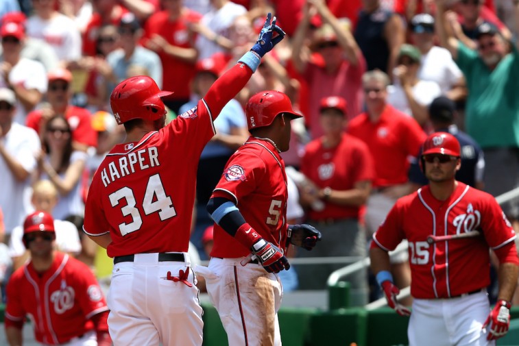 Bryce Harper celebrates a home run with his teammates